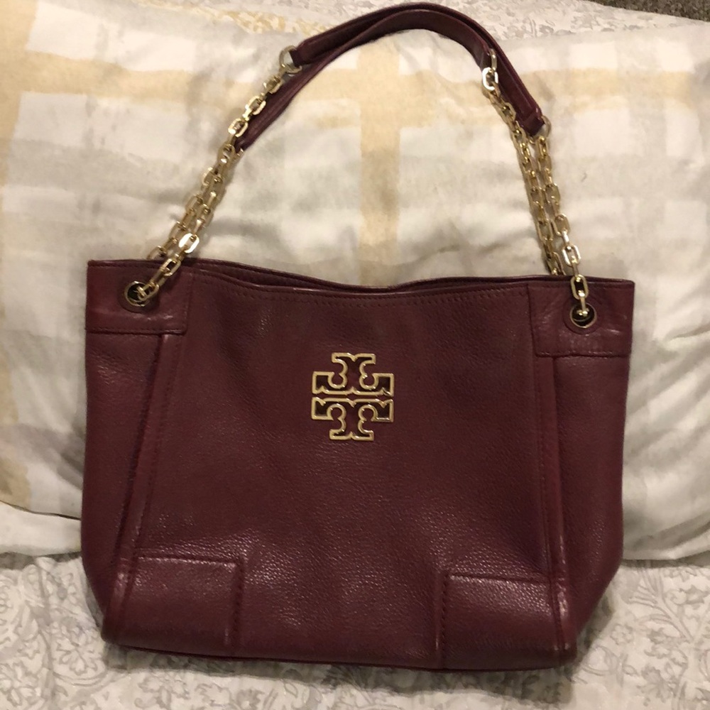Tory Burch bag maroon or plum color approximately